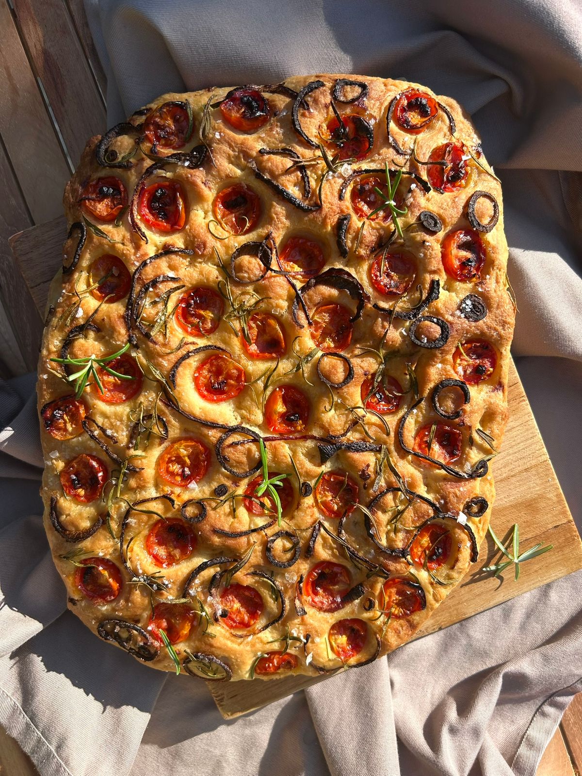Focaccia with tomatoes and red onions
